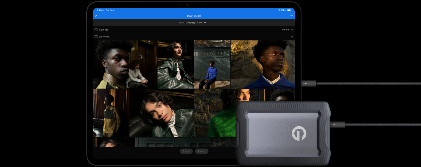 iPad Pro, front exterior, landscape orientation, space black colour, connected with a cable to a USB-C external hard drive, display showing photos of models being imported to a folder called ‘Campaign Shoot’