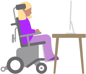Una persona en una silla de ruedas motorizada mira una computadora Mac ubicada en un escritorio