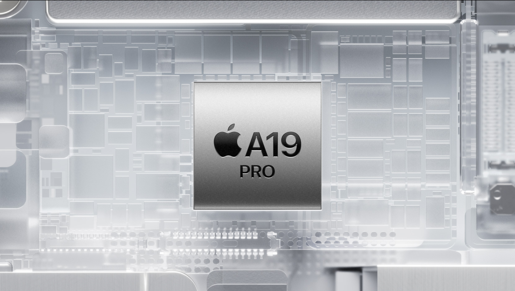 Puce A19 Pro entourée de composants internes de l’iPhone