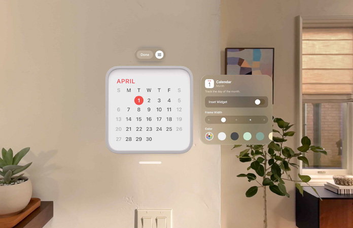 Calendar widget reading: April 1st floats on wall, reminder widget above, personalization options to change frame thickness and color to right